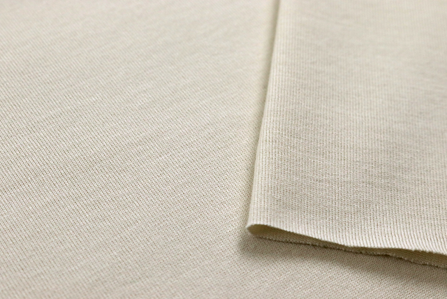 お値打ちな1.5mカット コットン天竺ニット サンドベージュ 表面アップ（編み目と質感）