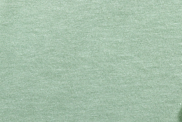 お値打ちな1.5mカット コットン天竺ニット アスパラグリーン フラットな状態（色味と全体の表情）