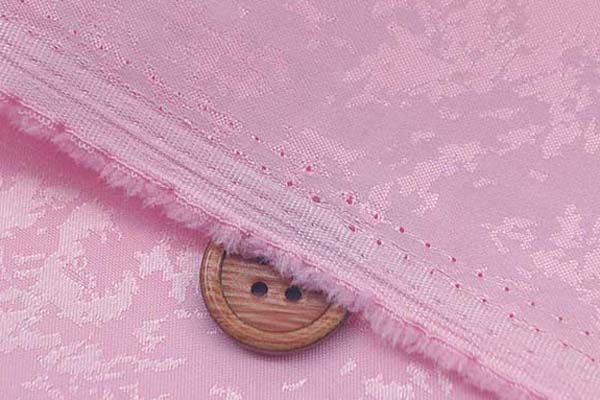 イベントや衣装に最適な光沢感のある素材　ポリエステルジャガード　炎の柄　ピンク  