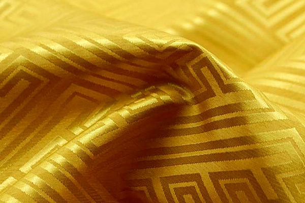 イベントや衣装に最適な光沢感のある素材　ポリエステルジャガード　紗綾形　黄色  