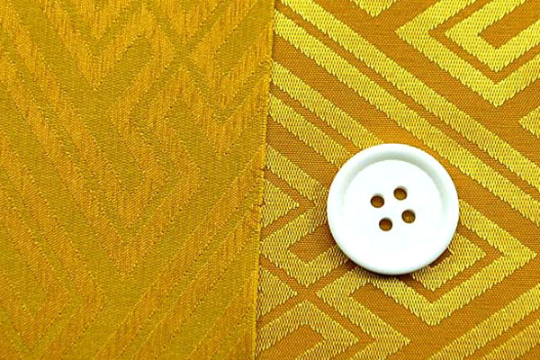 イベントや衣装に最適な光沢感のある素材　ポリエステルジャガード　紗綾形　黄色  