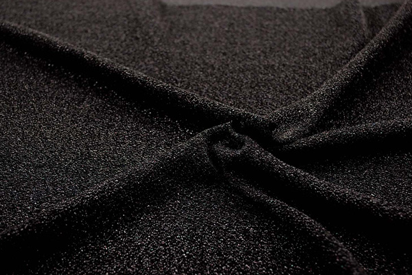 イベントや衣装に最適な光沢感のある素材　ラメ入りニット　黒  