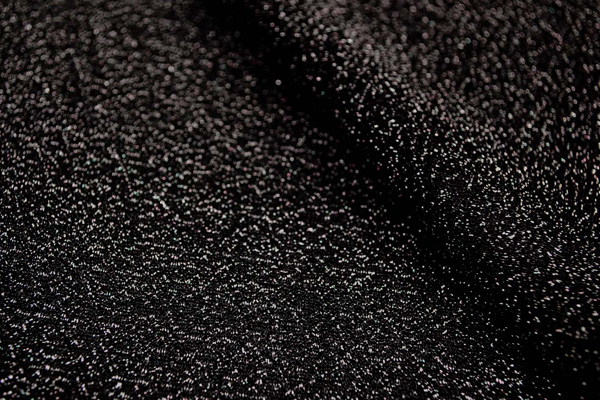 イベントや衣装に最適な光沢感のある素材　ラメ入りニット　黒  