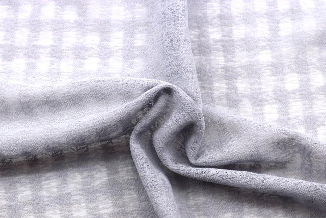 ストレッチチェックニット 薄グレー ねじりによる伸縮性と質感