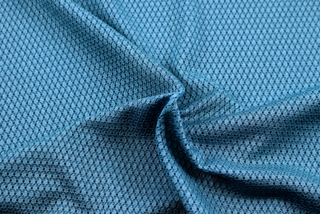 トリアセ ドビージャガードニット ターコイズブルー ドレープ