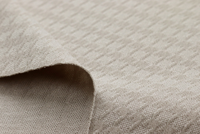 東レ ジャガードニット 千鳥格子 グレージュ ドレープ(伸縮イメージ)