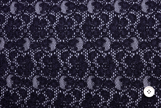 デニム調プリント紺紫色のラッセルレース生地全体