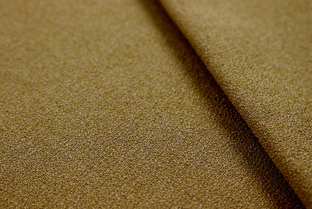 ポリエステルジョーゼット カーキ生地の耳部分