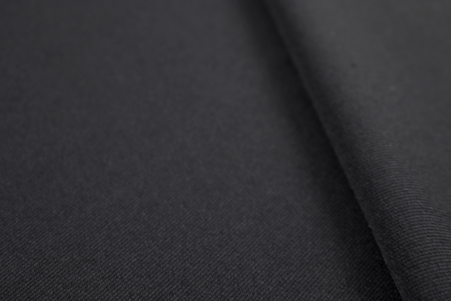 ストレッチ トリアセ ポンチニット 黒 端・裏面アップ