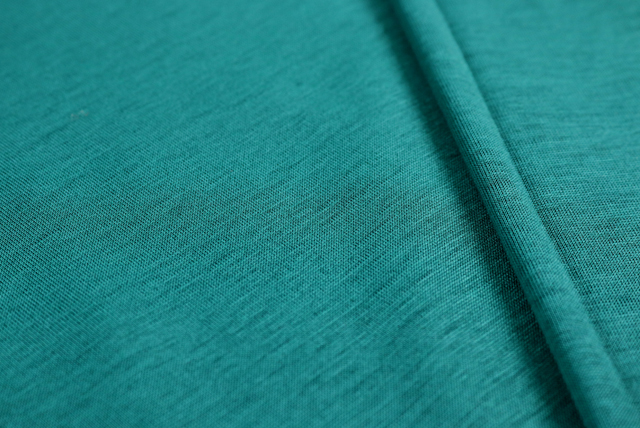 シルケット加工 天竺ニット ピーコックグリーン 表面アップ