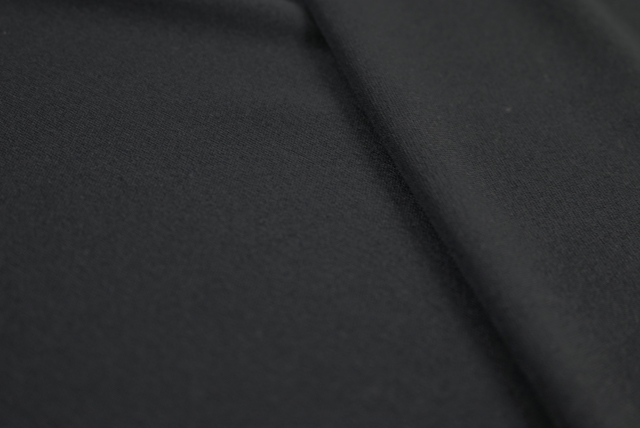 ポリエステル スムースニット 黒 表面アップ(フラットな質感)(江戸ッ子 210ya)