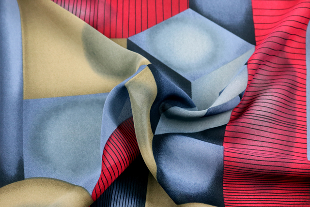 ポリエステル ジョーゼット 幾何プリント カーキグリーン系 ドレープと落ち感