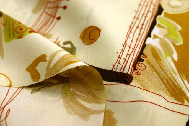 デシンプリント 和モダン更紗調 ピーチ 生地端のアップ（江戸ッ子 210ya）