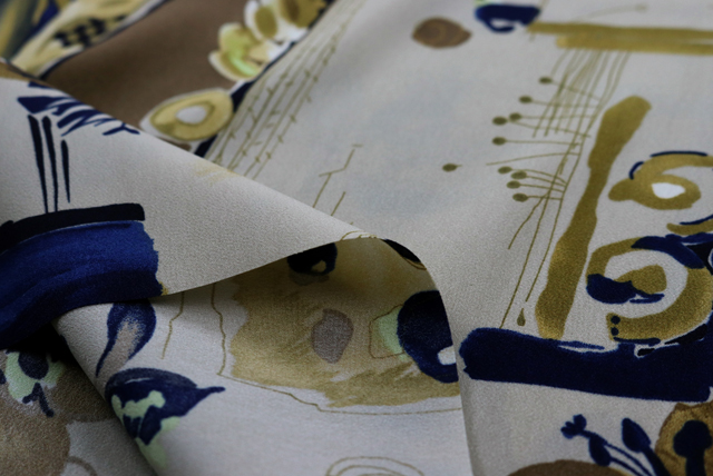 デシンプリント 和モダン更紗調 グレージュ 生地端のアップ（江戸ッ子 210ya）